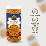 "Crunchy Quinoa Bhujia inside a clear transparent jar, healthy snacks photography, clean white background."